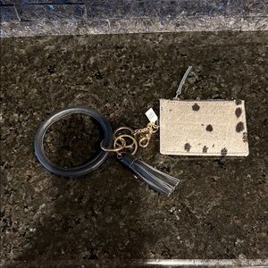 Cowhide and leather change purse/card holder.